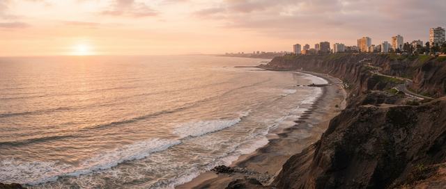 The Miraflores coastline in Lima at sunset
